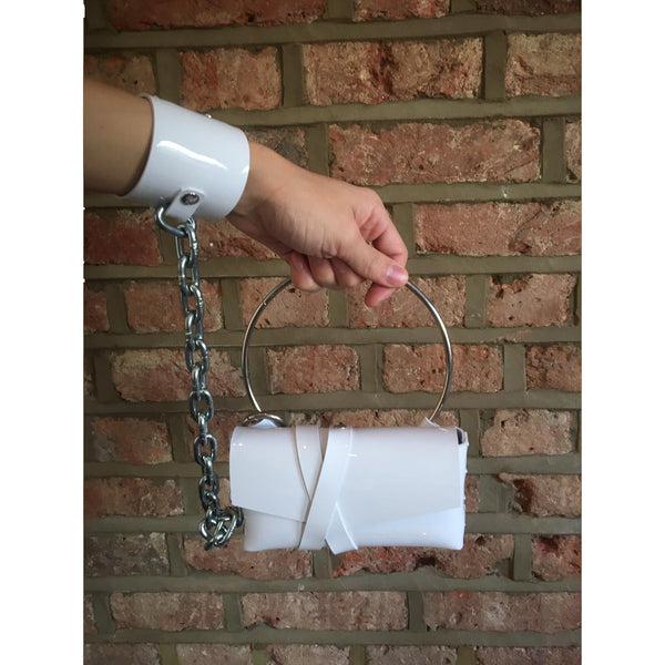'PURRJJA' Handbag with chain and wrist cuff