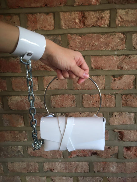 'PURRJJA' Handbag with chain and wrist cuff